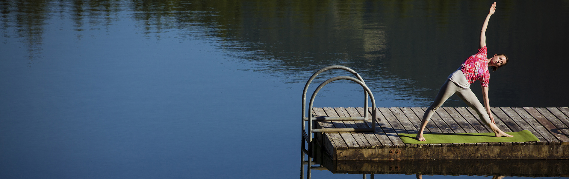 Woman Doing Yoga on Dock